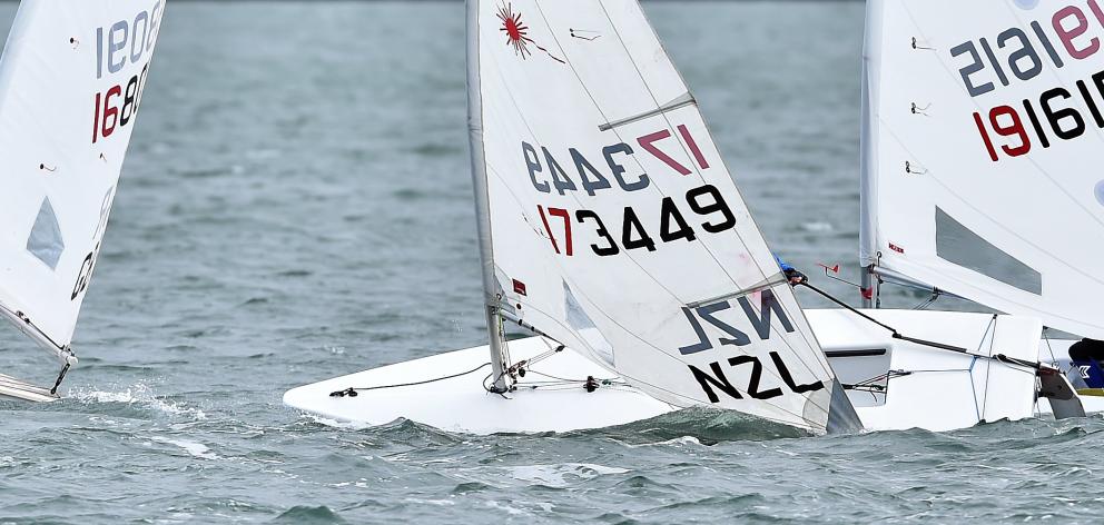 Boats race in the Vauxhall Yacht Club’s Laser 50th anniversary regatta on Otago Harbour on...