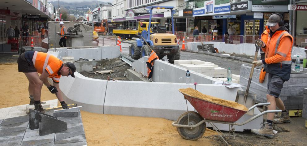 Paving tiles go in next to precast concrete fixtures in George St this week. PHOTO: GERARD O’BRIEN