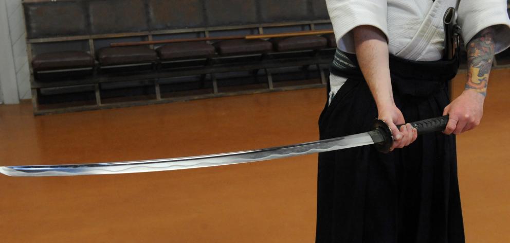 Cameron Lindsay holds a sword during aiki-jujutsu at the St Leonards Hall. PHOTOS: LINDA ROBERTSON