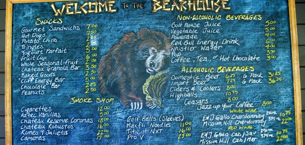 Menu board outside the Bear House snack shack at Chateau Whistler Golf Club. PHOTO: PAUL MARSHALL