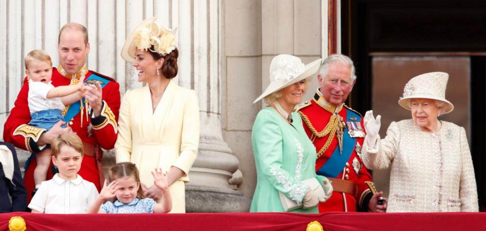 A slimmed down version of the royal family, focusing on the line of succession, on the balcony at...