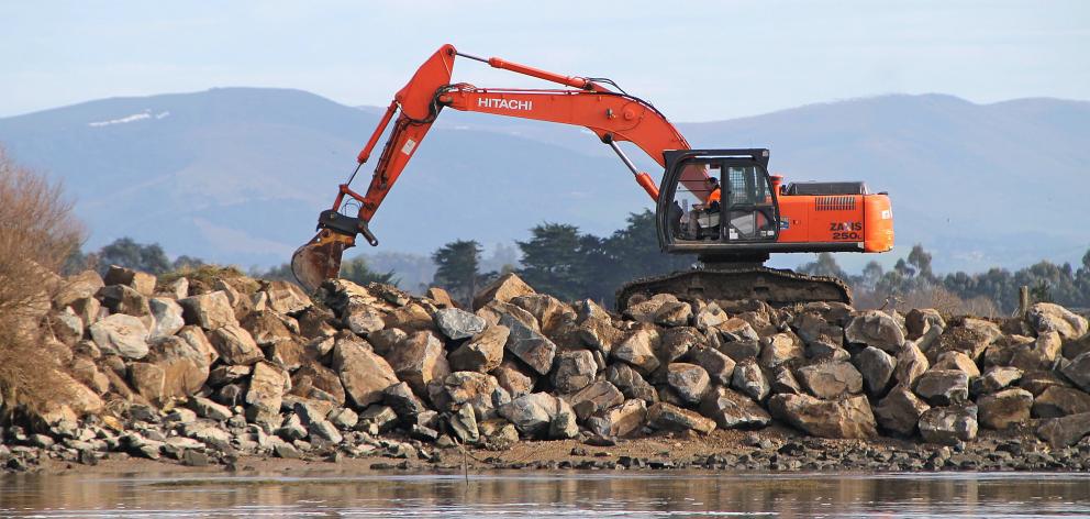 The rock wall at the river mouth of the Koau branch of the Clutha River is undergoing repairs for...