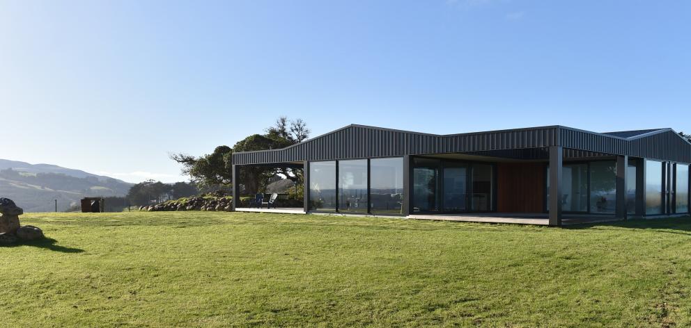 A cross-shaped floor plan means this house in Green Island Bush Rd captures sun and views but...