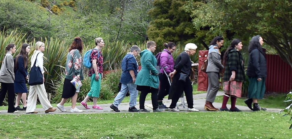 Members of the public are led to the opening ceremony of the Dunedin Writers & Readers Festival,...