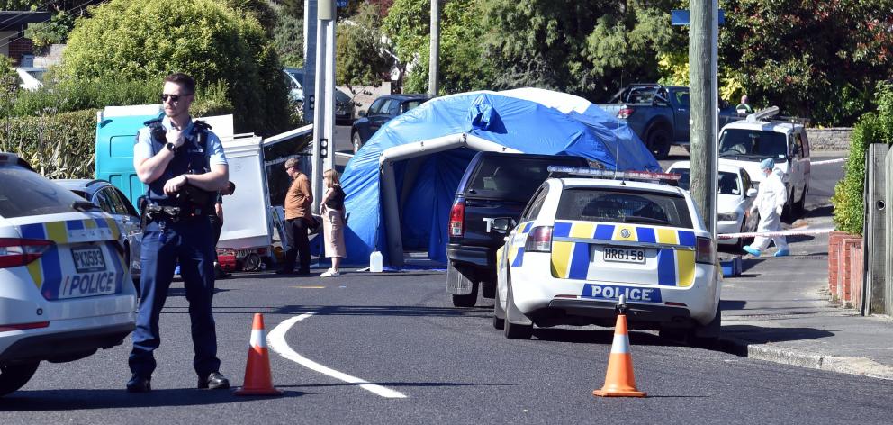 The scene in Hillary St last night near where a man was found dead yesterday morning. PHOTO:PETER...