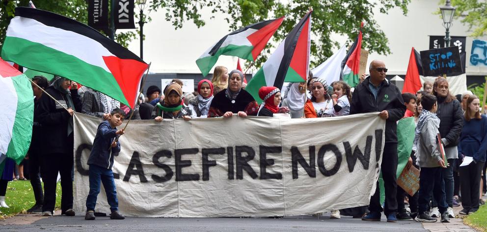 Hundreds of protesters marched to the Octagon calling for a ceasefire in the Israel-Palestine...