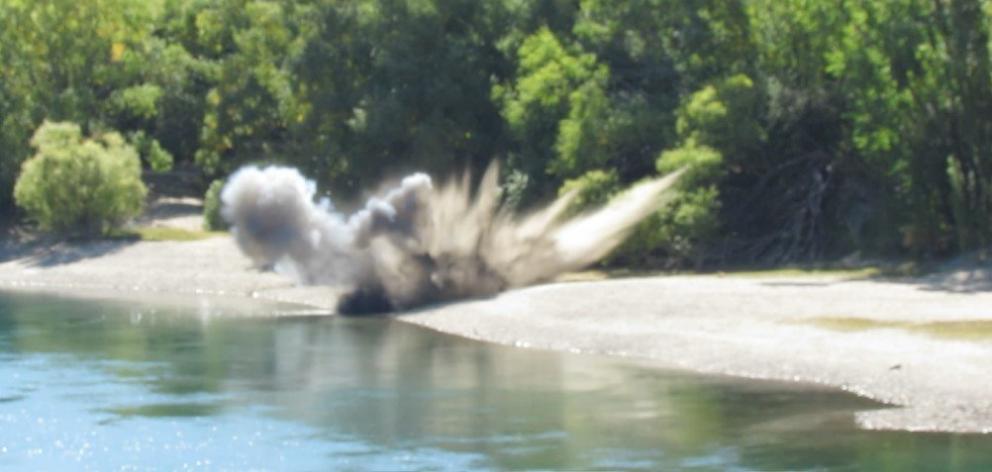 Two explosives found on the riverbank near Clyde were detonated by the New Zealand Defence Force...