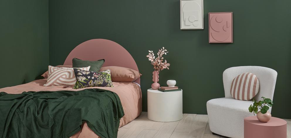 Rich jewel tones, like the deep emerald of these walls painted in Resene Forest Green, make for a...