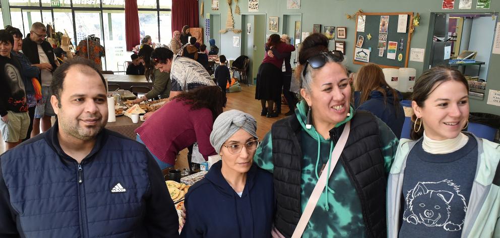 Gathering at Araiteuru Marae on Saturday were people from many backgrounds, including (from left)...