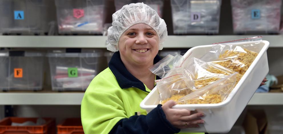 Emily Gibson, hard at work at Cargill Enterprises, will graduate from the Cargill Academy...