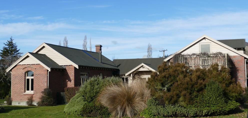 The exterior of the property, showing the converted church to the left, and a 2006 extension to...