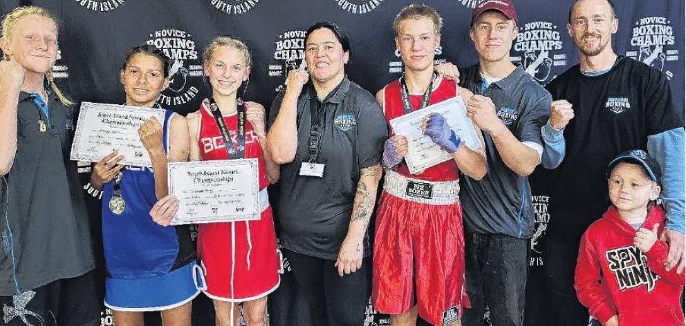 Bo-Dean Blackburn (centre) with some of her young up-and-coming boxers. PHOTO: SUPPLIED