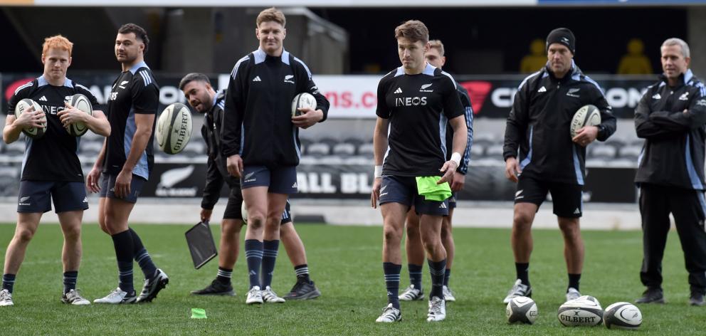 Beauden Barrett (right) and younger brother Jordie compete in a kicking game at the end of the...