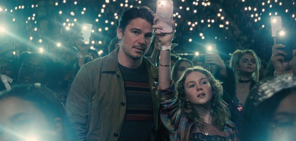 Josh Hartnett as Cooper and Ariel Donoghue as Riley in Trap. PHOTO: WARNER BROS. PICTURES