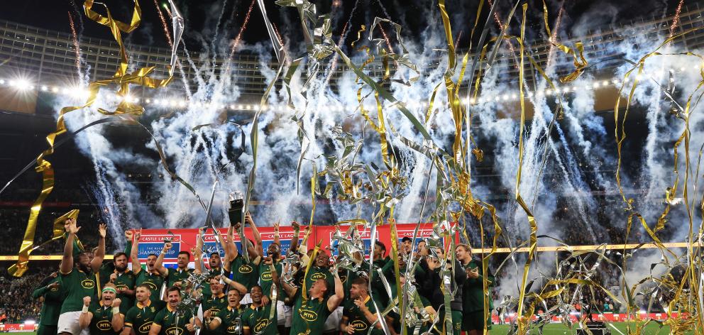 South Africa celebrate with the Freedom Cup after victory over the All Blacks in Cape Town. Photo...