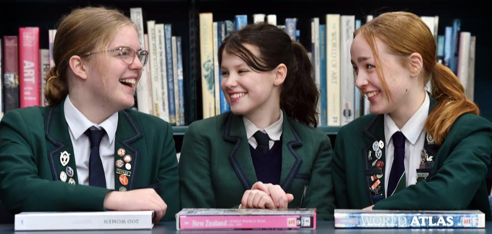 Columba College debaters (from left) Jessica Mundy, 17, Emily Roy, 15, and Clara Ballantyne, 18,...