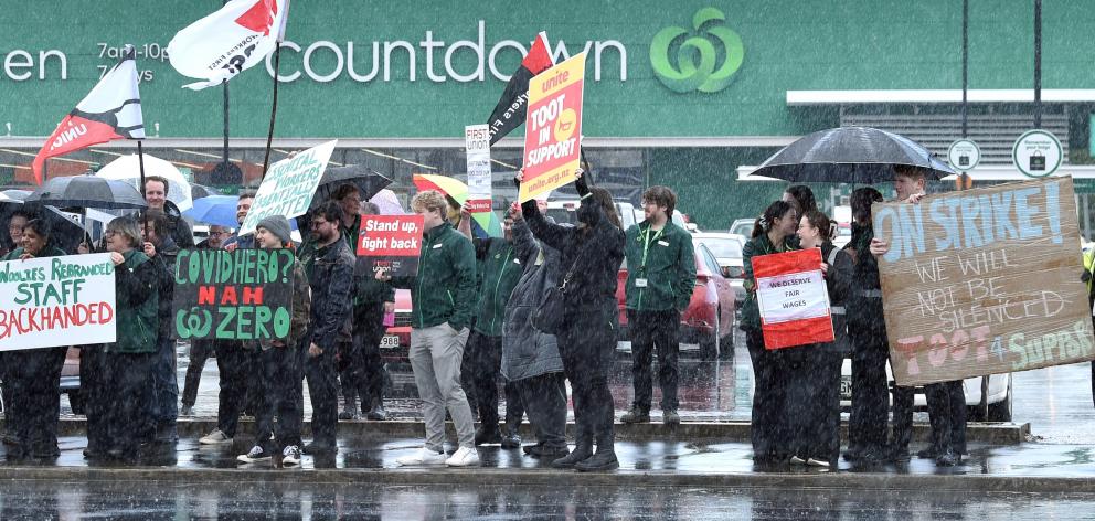 Woolworths union members from the chain’s supermarkets around Dunedin gather outside the South...