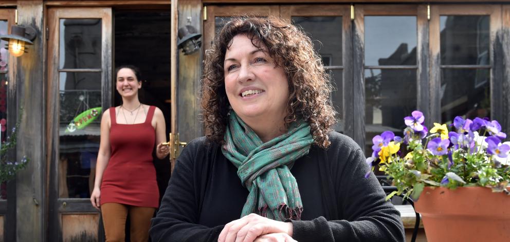 Robyne Saunders (centre) has sold Cafe Santosha, in Port Chalmers, to Sophia Clarke-Edwards who...