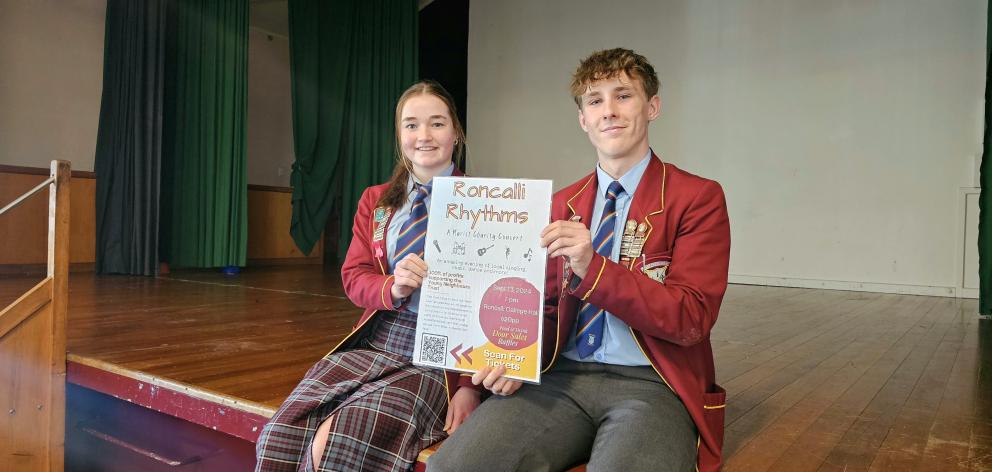 Getting the word out about Roncalli Rhythms are head students Neave Bruin and Carter West, both...