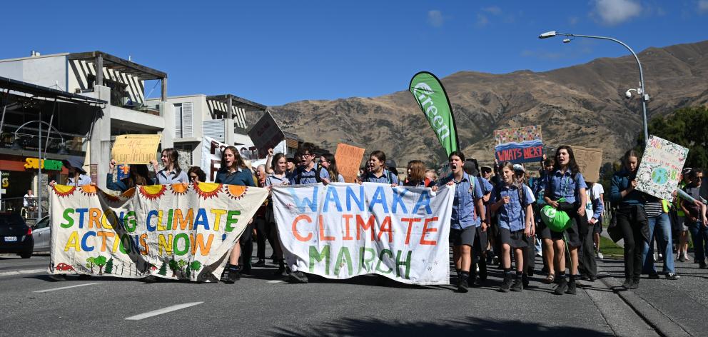 Mount Aspiring College pupils lead a crowd on a Climate Strike march through Wānaka. PHOTO: REGAN...