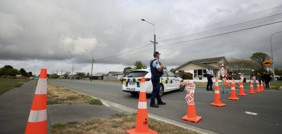 Police on Pages Rd after the incident. Photo: George Heard