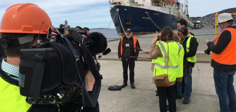 Expedition co-leader Professor Rupert Sutherland speaks with media in front of the JOIDES...