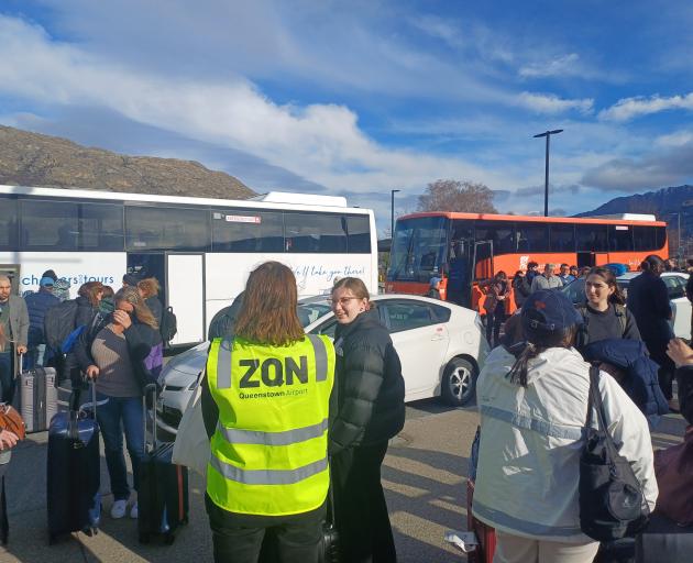 Passengers on last night's flight arrive back in Queenstown today. Photo: Olivia Judd 