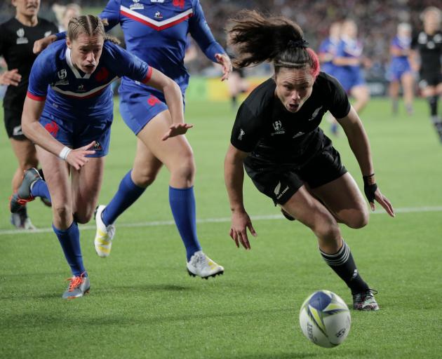 Black Fern Ruby Tui chases the ball before scoring a try against France. Photo: Reuters