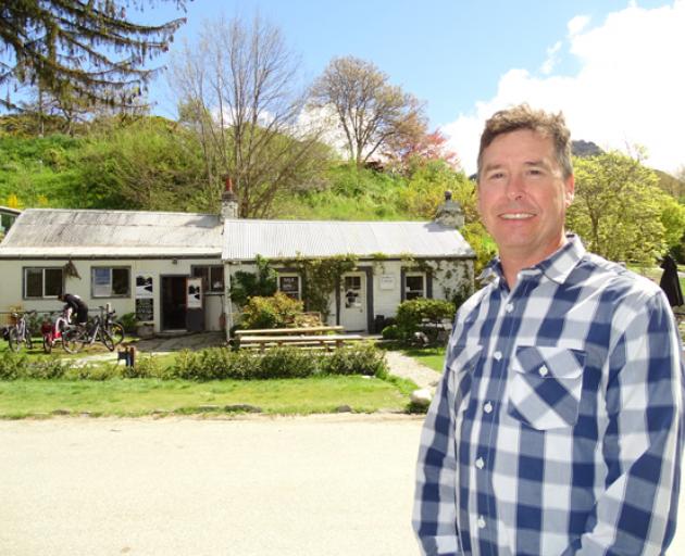 Dudley’s Cottage owner Scott Stevens, of Arrowtown, pictured outside the historic site. Photo:...