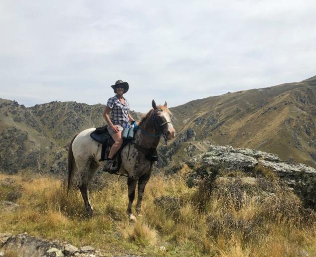 Jacqui Parsons on Reddog in the Waikerikeri Conservation Area. Photo: Supplied