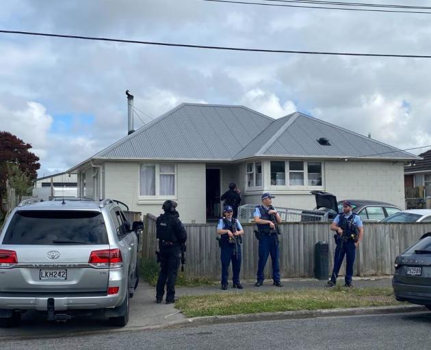 A house in Aranui has been raided by police investigating the homicide. Photos: NZ Herald