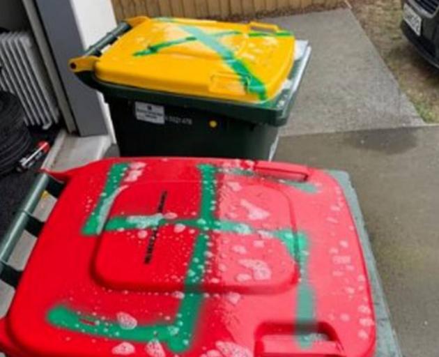 A family living on Burnham School Rd woke to find Nazi symbols on their bins. Photo: Supplied