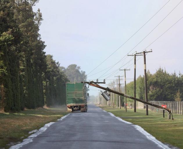 A power pole snapped at the base by the wind near Oxford. Photo: George Heard