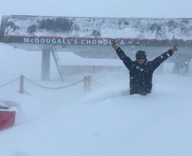 Cardrona head of sales Mat Woods stands in the fresh snow next to McDougall's Chondola this...