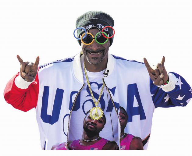 Snoop Dogg makes an appearance at the skateboarding men’s park final at the Place de la Concorde...