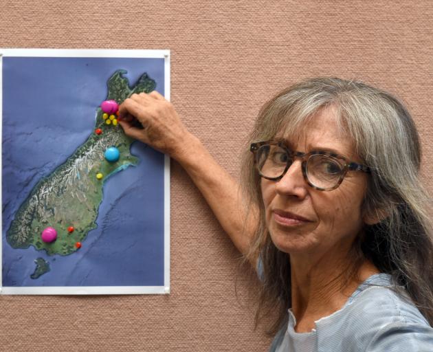 Rosemary Penwarden places pins on a map to show proposed and existing coal mines in the South...