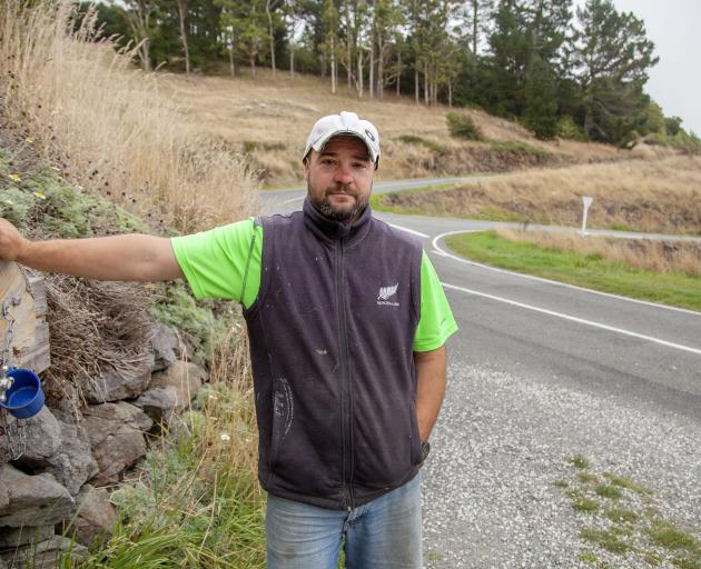 Dmitri Rechkunov spends a lot of time picking up rubbish at the top of Mt Pleasant Rd.  Photo:...