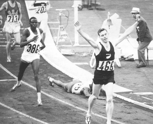 Peter Snell celebrates winning the 800m Olympic final in Tokyo, 1964. PHOTO: ODT FILES