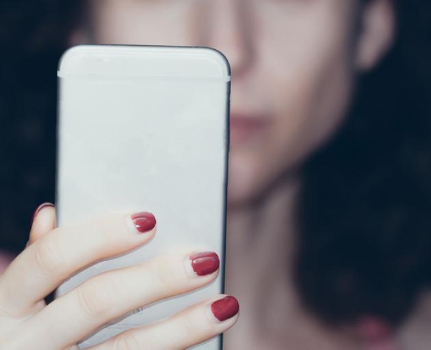 There is at least one phone for every person in New Zealand. Photo: Getty Images 