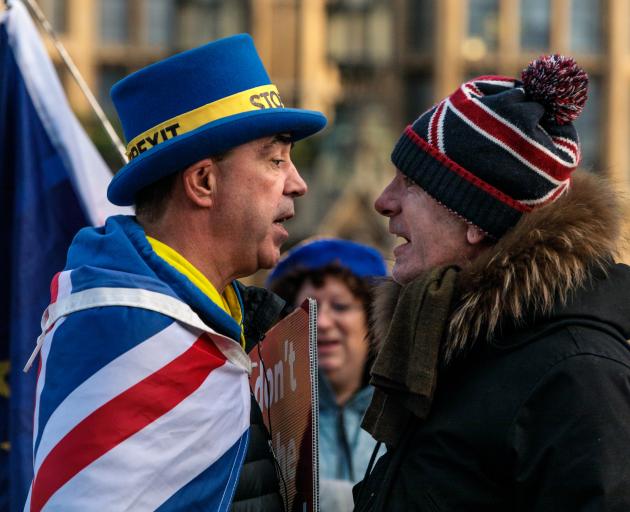 Two men debate the merits of Brexit in London. Photo: Getty Images 