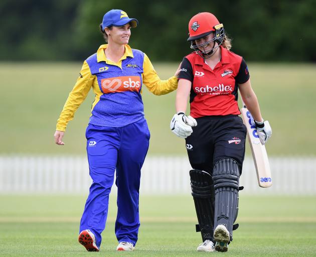 Abigale Gerken of the Magicians (R) is congratulated by Katey Martin of the Sparks after being...