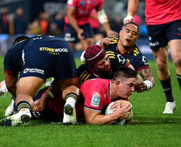 Richard Hardwick of the Melbourne Rebels scores a try. Photo: Getty Images