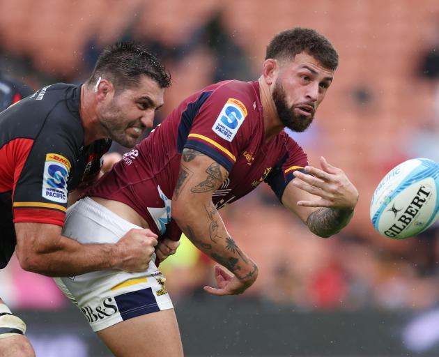 Jacob Ratumaitavuki-Kneepkens of the Highlanders passes the ball during today's Super Rugby...