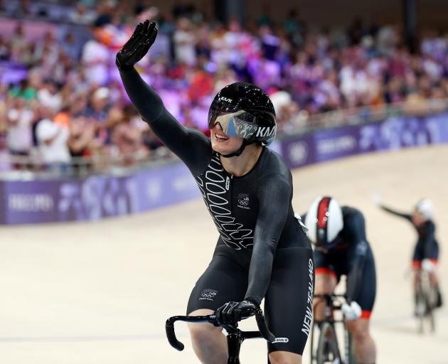 New Zealand’s Ellesse Andrews celebrates her victory in the women’s keirin final on day 13 of the...