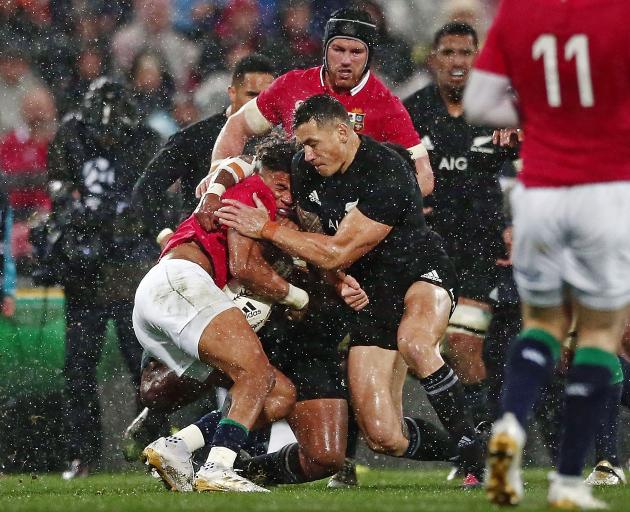 Anthony Watson of the Lions is hit with a high tackle by Sonny Bill Williams. Photo: Getty Images 