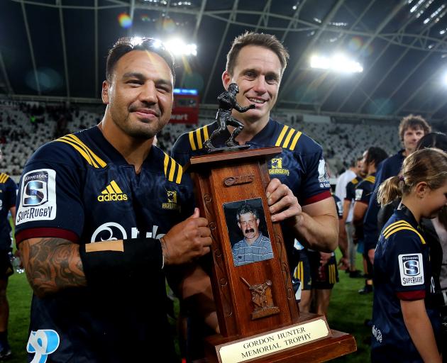 Ash Dixon (left) and Ben Smith of the Highlanders with the Gordon Hunter Memorial Trophy after...