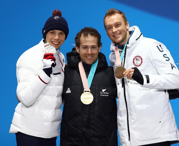 From left: silver medallist Arthur Bauchet of France, gold medallist Adam Hall of New Zealand and...