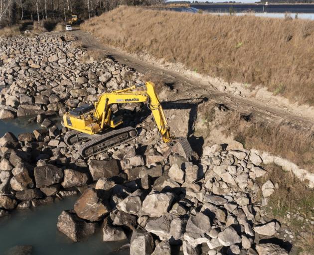 A digger works on flood protection at the Rangitata River. Photo: Supplied by Environment Canterbury