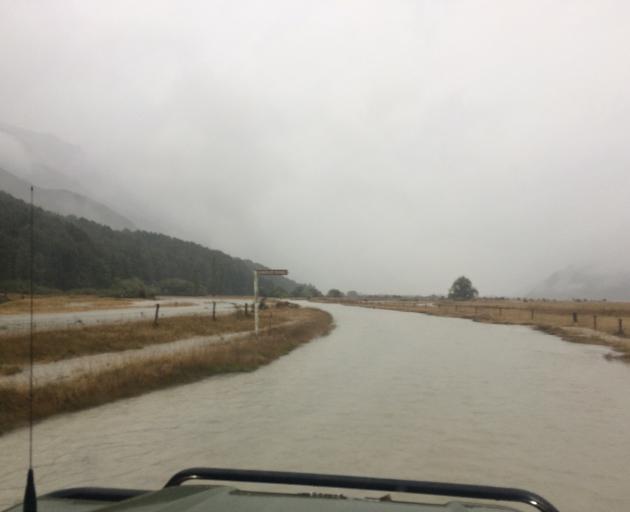 Flooding on Kinloch Rd, near Lake Wakatipu, today. Photo: Downer