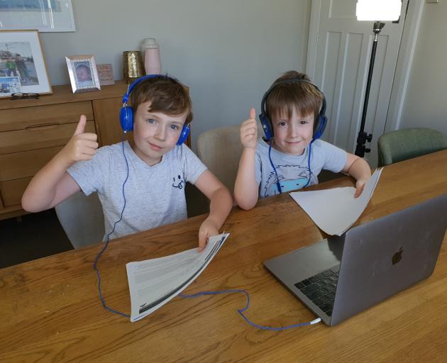 Finn and Arlo Burnett prepare for their latest edition of McFaddens News. Photo: Supplied